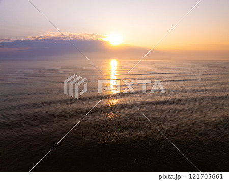Aerial view sunset sky,Nature beautiful light sunset or sunrise over sea,Colorful scenery sunset sky,Amazing clouds and waves texture, sunrise sky background 121705661