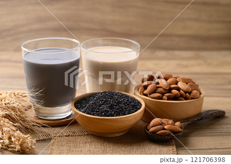 Alternative milk made from plant on wooden background, non dairy, Vegan food Alternative milk made from plant on wooden background, non dairy, Vegan food 121706398