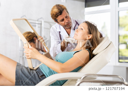 Attending medical consultation. Attending medical consultation. 121707194