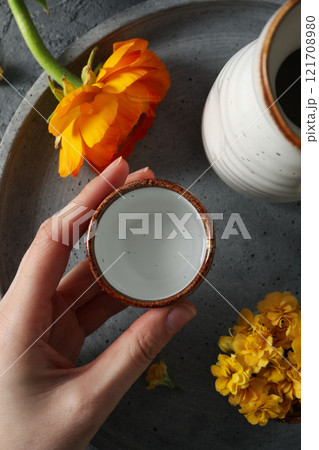 Japanese rice tincture, an alcoholic drink, on a dark background. 121708980