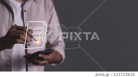 Young man hand holding smartphone mobile using a pen touching to sign a Contract signing Young man hand holding smartphone mobile using a pen touching to sign a Contract signing 121713618