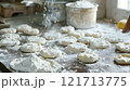 Diwali, Dough being shaped into small circles 121713775