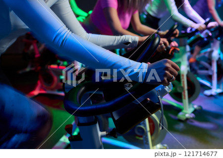 Musical instrument enthusiasts enjoy playing guitars in a gym 121714677