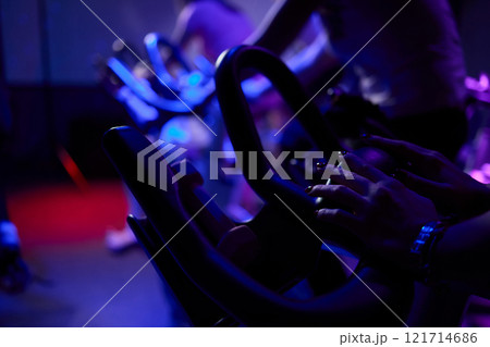 Musical instrument enthusiasts enjoy playing guitars in a gym 121714686