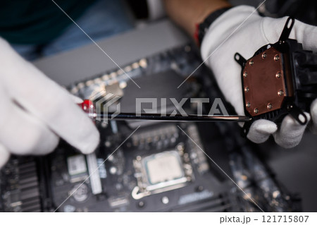 The process of properly installing a CPU cooler water cooling in a custom built personal computer system The process of properly installing a CPU cooler water cooling in a custom built personal computer system 121715807