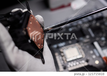 The process of properly installing a CPU cooler water cooling in a custom built personal computer system 121715810