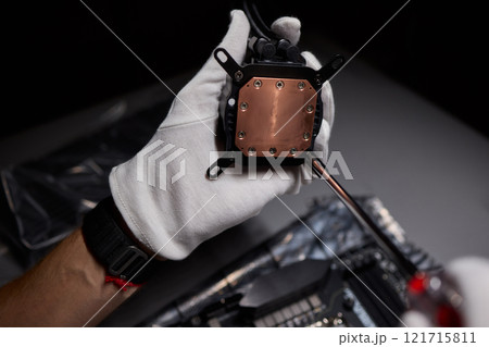 The process of properly installing a CPU cooler water cooling in a custom built personal computer system The process of properly installing a CPU cooler water cooling in a custom built personal computer system 121715811