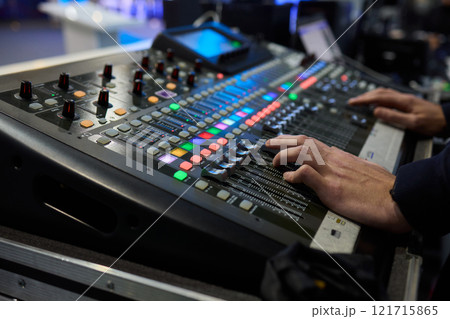 This is a professional audio mixing console that features colorful faders for enhanced usability 121715865