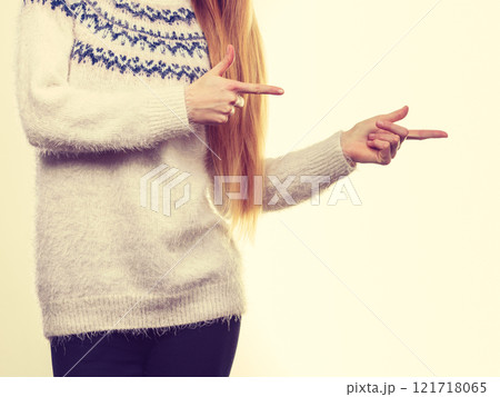 Woman legs in black trousers and furry jumper Woman legs in black trousers and furry jumper 121718065