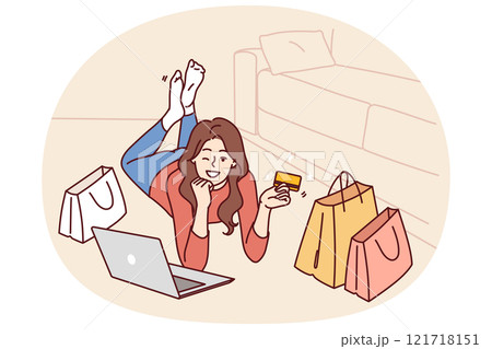 Woman with credit card and laptop after internet shopping or ordering goods on website store 121718151