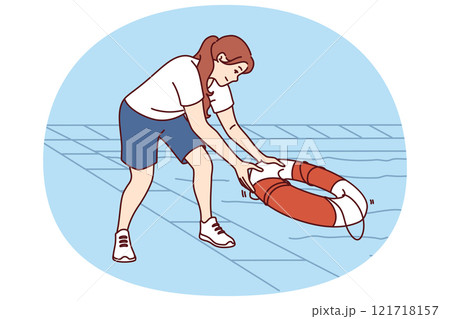 Woman throws lifebuoy into pool to help drowning or non-swimmer who has fallen into water 121718157
