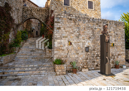 Statue of miguel cervantes in the old town of Ulcinj in montenegro 121719438