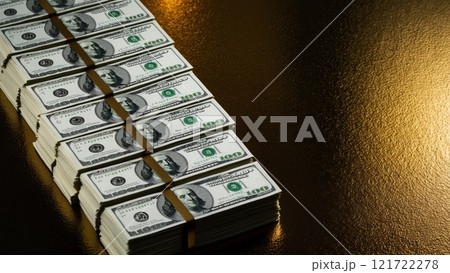 Bundles of Dollars on a Luxurious Gold Background 121722278