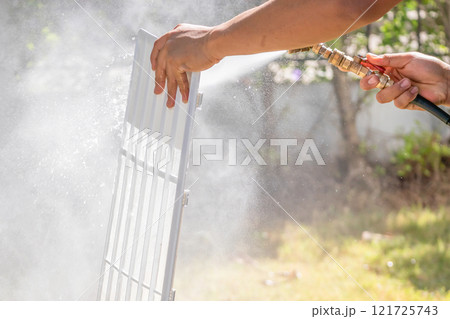 air conditioning filter cleaning with water spray air conditioning filter cleaning with water spray 121725743