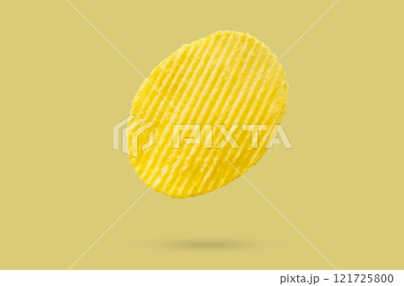 potato chip isolated on yellow background 121725800