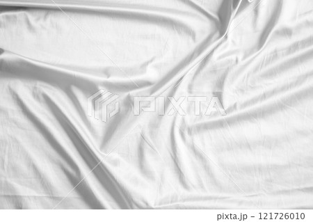 Abstract white wrinkled bedding sheet fabric texture background Abstract white wrinkled bedding sheet fabric texture background 121726010
