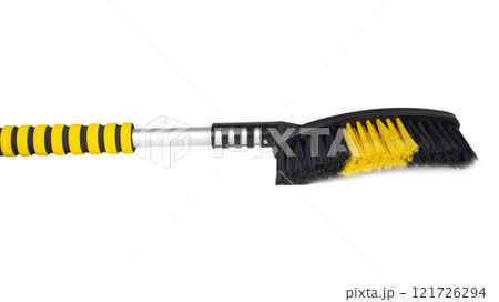 Winter car brush for removing snow plastic scrapper isolated on the white Winter car brush for removing snow plastic scrapper isolated on the white 121726294