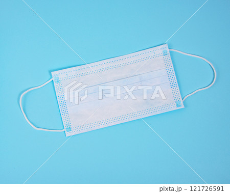 Medical breath clinic filter mask on blue background 121726591