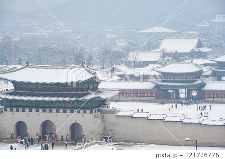 Winter snow at Gyeongbokgung Palace in Seoul, South Korea. Geunjeongjeon Pavilion of Gyeongbokgung South Korea's historical landmarks Winter snow at Gyeongbokgung Palace in Seoul, South Korea. Geunjeongjeon Pavilion of Gyeongbokgung South Korea's historical landmarks 121726776