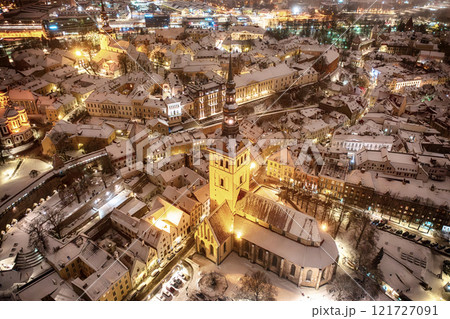 Aerial night View of Tallinn in winter, roofs are covered with snow, Christmas mood Aerial night View of Tallinn in winter, roofs are covered with snow, Christmas mood 121727091