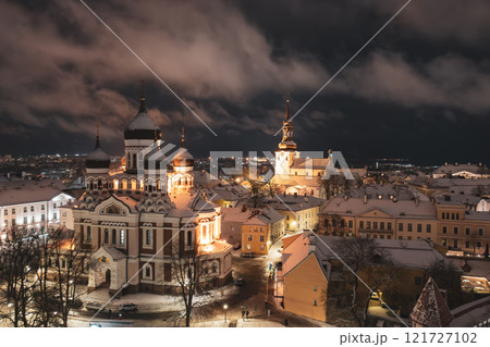 Aerial night View of Tallinn in winter with Alexander Nevsky Cathedral, roofs with snow, Christmas mood 121727102