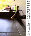 Close-Up of Brass Water Tap Over Sink 121727337