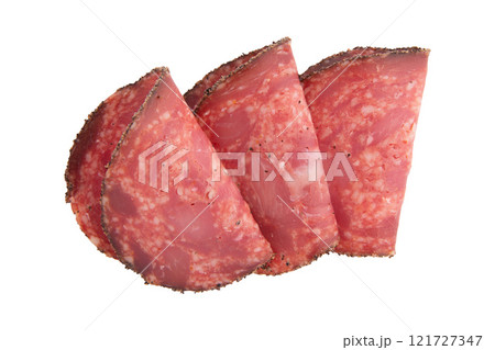 slices of spanish sausage isolated on white 121727347