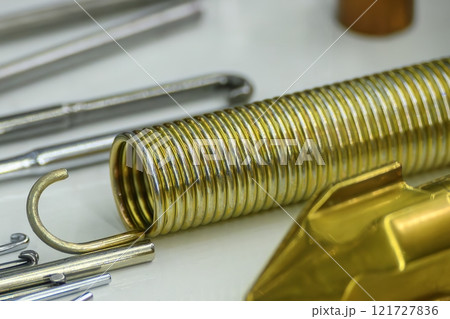 The tension wire coil spring in the light blue scene. The tension wire coil spring in the light blue scene. 121727836