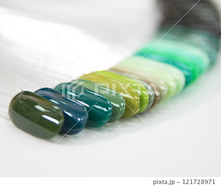 Multicolor different palette gel varnishes examples for manicure on the white background 121728971