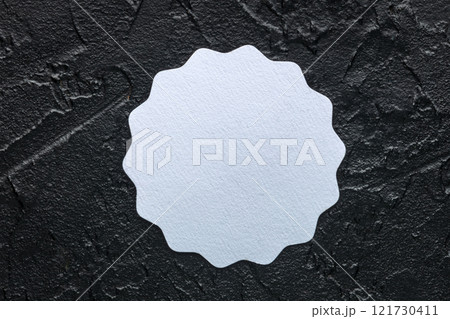 Coaster mockup. Overhead flat lay shot of a paper beermat, a template 121730411