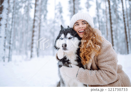 A young woman with her pet on an adventure. Friendship concept, pets. A young woman with her pet on an adventure. Friendship concept, pets. 121730733