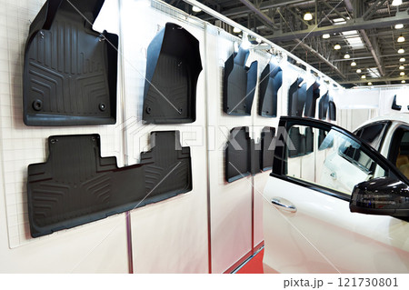 Rubber mats for car interior in shop Rubber mats for car interior in shop 121730801