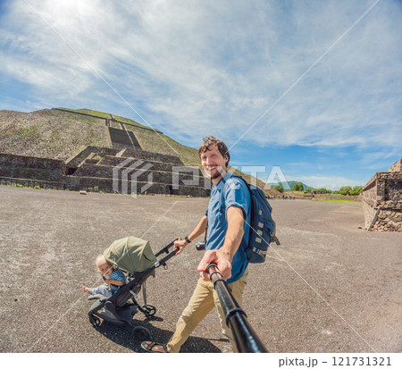 Dad and his son tourists exploring Teotihuacan, Mexico. Solo traveler walking through ancient pyramids and ruins at sunrise. Concept of cultural heritage, archaeology, and Mexican tourism Dad and his son tourists exploring Teotihuacan, Mexico. Solo traveler walking through ancient pyramids and ruins at sunrise. Concept of cultural heritage, archaeology, and Mexican tourism 121731321