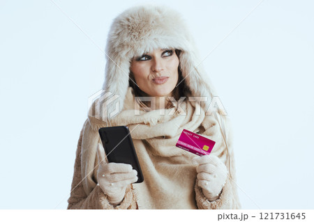 happy stylish woman using smartphone on white 121731645