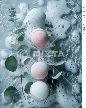 Bath Bombs with Eucalyptus Leaves on Water Surface with Foam 121734986