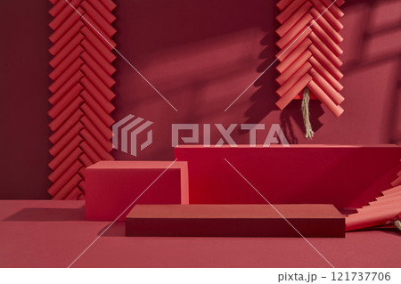 Three red rectangular platforms with a blank area for product displays, and decorated with red firecrackers, are ideal for a Chinese New Year design against a crimson backdrop. Three red rectangular platforms with a blank area for product displays, and decorated with red firecrackers, are ideal for a Chinese New Year design against a crimson backdrop. 121737706