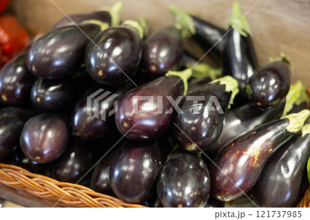 Nice batch of freshly gathered eggplants laying in market for sale 121737985