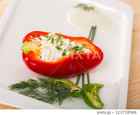 Stuffed half of pepper with brynza, dish of Bulgarian cuisine Stuffed half of pepper with brynza, dish of Bulgarian cuisine 121738566