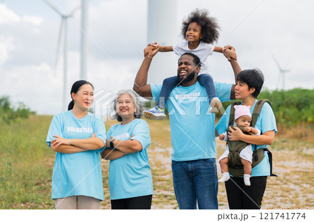 group of people wearing blue shirts with the word volunteer on them group of people wearing blue shirts with the word volunteer on them 121741774