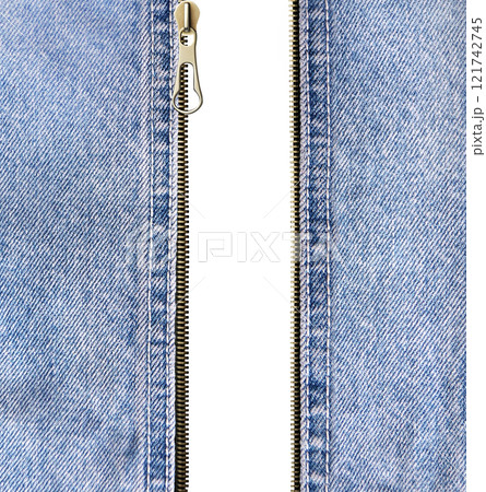 Denim zipper opened. Unzipped zipper or fastener. Open zip and denim fabric. Isolated on white background 121742745