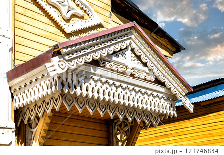 Wooden carved decorations of a vintage traditional russian house Wooden carved decorations of a vintage traditional russian house 121746834