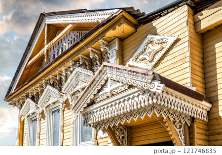 Wooden carved decorations of a vintage traditional russian house Wooden carved decorations of a vintage traditional russian house 121746835