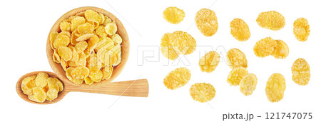 Cornflakes in wooden bowl and spoon isolated on white background. Top view. Flat lay Cornflakes in wooden bowl and spoon isolated on white background. Top view. Flat lay 121747075