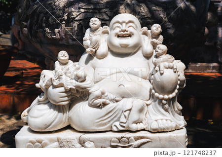 The white Buddha inside the Temple on the Marble Mountains in Da Nang, Vietnam 121748237