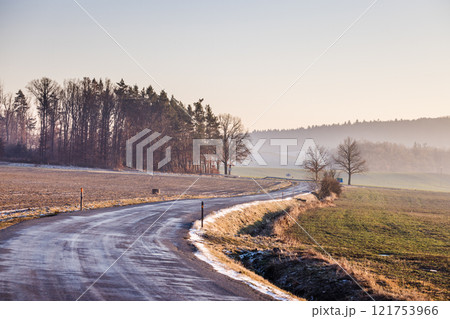 Winding road through rolling countryside in Region Pilsen in Czech Republic, Europe. 121753966