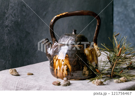 Handmade ceramic teapot 121756467