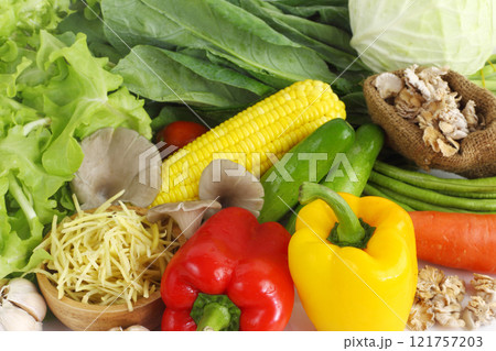 Group of many colorful vegetables isolated on white background 121757203