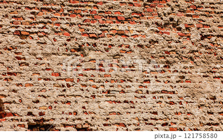 The texture of the stone wall. Background texture of the stone wall of the old building. Stone wall as background or texture. 121758580