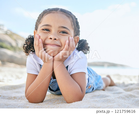 Portrait of one adorable little playful girl relaxing with her hands on her face on a mat at the beach shore. Cheerful cute innocent latino girl smiling while having fun on a summer vacation Portrait of one adorable little playful girl relaxing with her hands on her face on a mat at the beach shore. Cheerful cute innocent latino girl smiling while having fun on a summer vacation 121759616