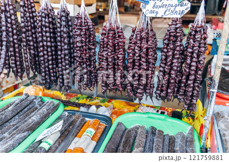Churchkhela made from nuts hangs at a local market. Churchkhela made from nuts hangs at a local market. 121759881